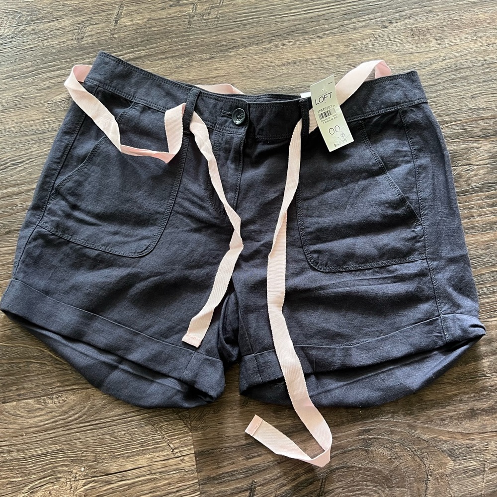 New with tags Loft size 00 navy belted linen shorts.
